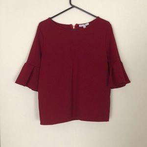 Bell sleeve blouse.